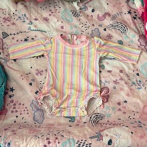 Ruffle buts baby girl rash guard